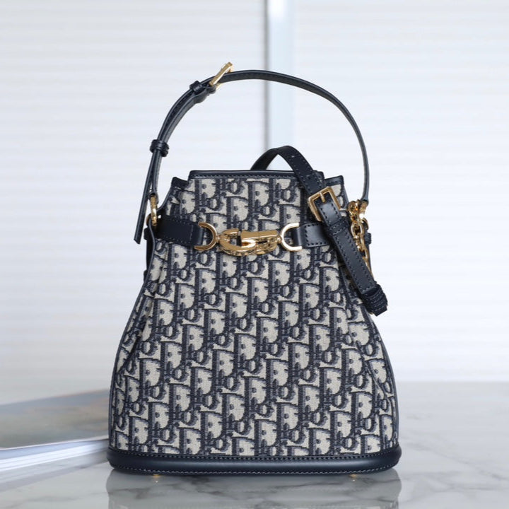 MONTAIGNE MEDIUM 24 BUCKET BAG IN BLUE OBLIQUE JACQUARD CALFSKIN